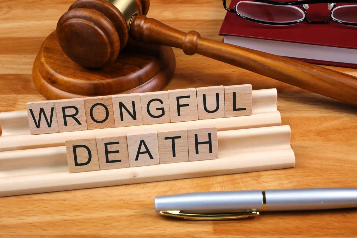 Wrongful death attorney consulting with a grieving family